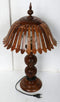 carved wood table lamp, table lamp, lamp on desk, table and lamp