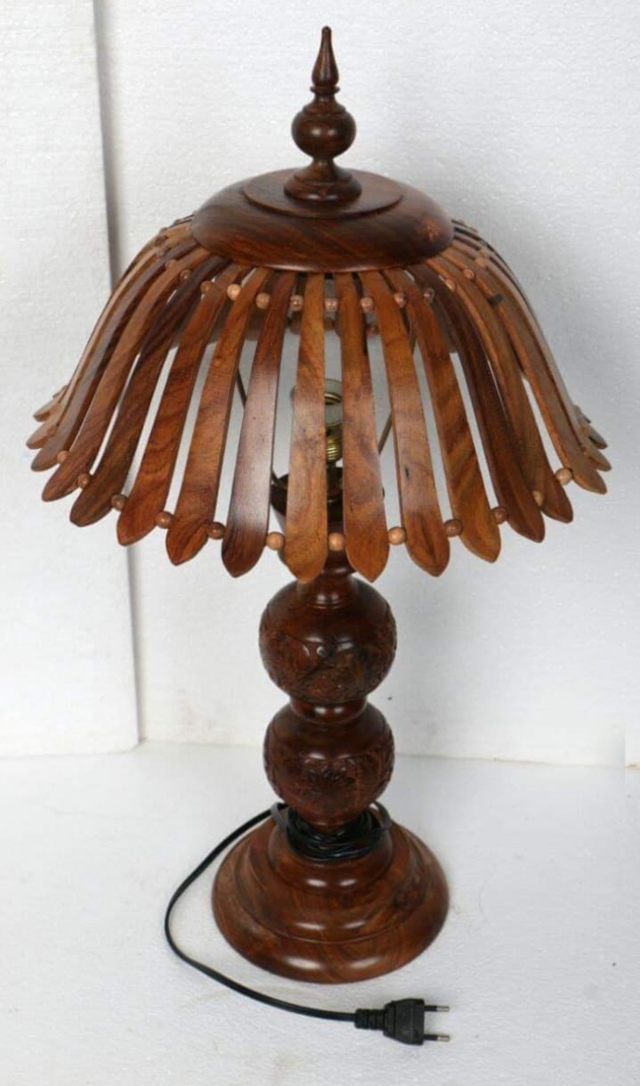 carved wood table lamp, table lamp, lamp on desk, table and lamp